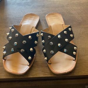 Pazzle black criss cross spiked slide on flats